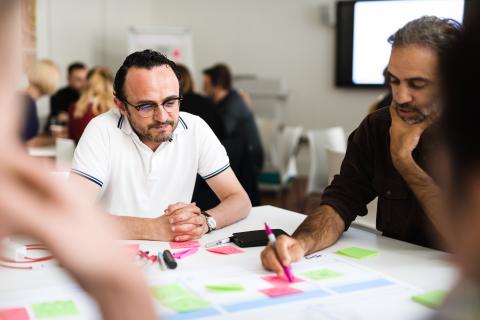 two men discussing a project